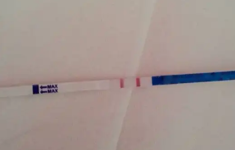 试管移植之后验孕棒测出来两条杠很浅是怀孕了吗？